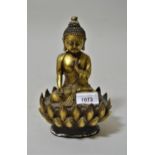 Tibetan gilt bronze Buddhistic seated figure, 8ins high