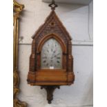 An impressive Victorian Gothic Revival bracket clock, the case modelled in the form of an