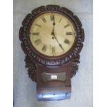 19th Century carved mahogany drop dial wall clock, the painted dial with Roman numerals and single