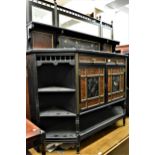 Victorian ebonised amboyna gilded and painted Aesthetic movement side cabinet, the mirrored shelf