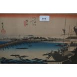 Pair of Japanese framed coloured wood block prints, figures and villages and figures with