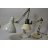 Anglepoise type adjustable table lamp, together with another similar, smaller