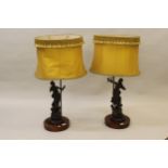 Pair of late 19th Century French dark patinated spelter figural table lamps after Moreau, mounted on