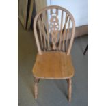 Set of six (five plus one) 20th Century oak wheelback dining chairs