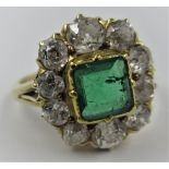 18ct Yellow gold emerald and ten stone diamond ring, the centre stone approximately 5mm square, size