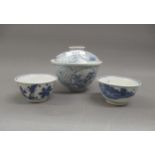 Small Chinese blue and white covered bowl, 4ins diameter, together with two blue and white tea bowls