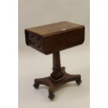 19th Century mahogany Pembroke type drop-leaf pedestal work table on a quadruped base