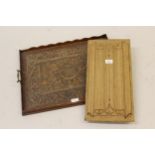 Linen fold carved oak panel and a rectangular carved oak tray decorated with oak leaves