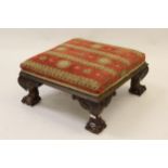 Early 20th Century mahogany square upholstered stool on carved cabriole claw and ball supports,