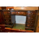 Reproduction mahogany serpentine fronted twin pedestal desk