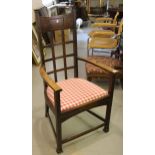Arts & Crafts beechwood open elbow chair raised on square supports with stretchers