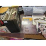 Box containing a quantity of various LP's and a small box containing a collection of various 45rpm