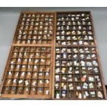 Large quantity of ceramic and other thimbles, housed in wooden display boxes