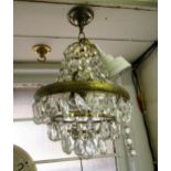 Pair of glass and gilt brass light fittings, 13ins high