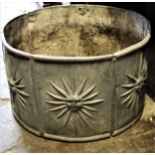 Circular lead garden planter decorated with sunburst design in relief, 19.75ins x 11.5ins Small