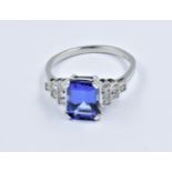 Platinum Art Deco style ring set central tanzanite flanked by diamonds, size N Of recent