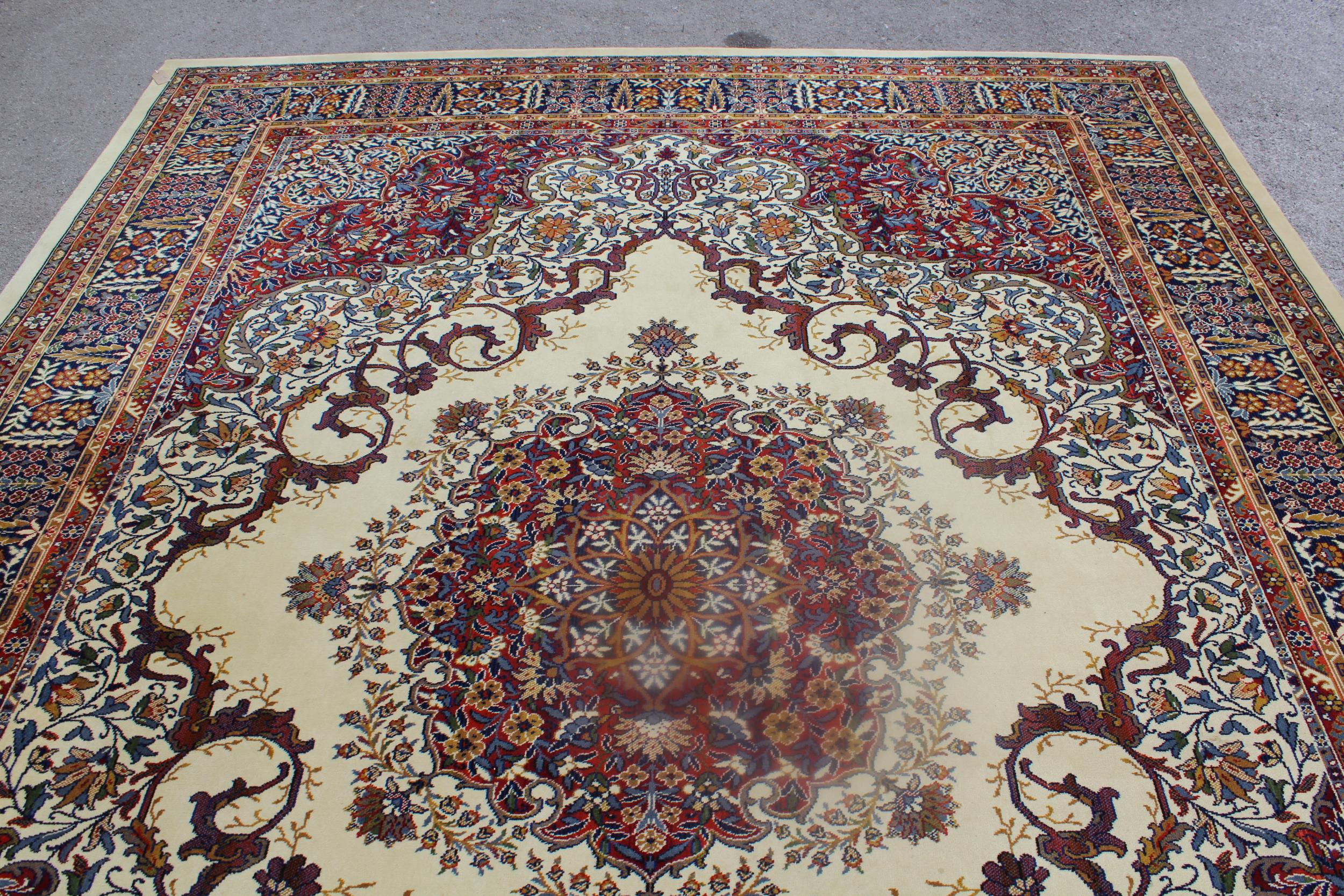 Machine woven Persian design carpet on beige ground, 144ins x 108ins - Image 2 of 4