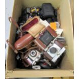 Box containing a quantity of various cameras and accessories