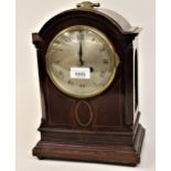 Edwardian mahogany line inlaid mantel clock having circular silvered dial with Roman numerals and