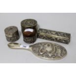 Chinese silver five piece dressing table set comprising: hand mirror, pin cushion and three