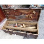 Wooden toolbox with various tools