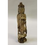 Chinese carved wooden and painted figure of a deity, 22.5ins high