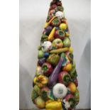 Large Italian Majolica pottery sculpture of fruit and vegetables, 37ins high Numerous cracks,