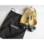 Chanel, pair of two tone slingback shoes with bows, size 37.5, with dust cover