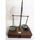 Pair of 19th Century mahogany and brass balance scales with drawer to base