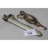 Silver mounted cigar cutter, Chester 1907 together with a plated paper clip in the form of a duck'