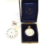 Continental silver cased keyless fob watch in original box, together with an enamel watch dial