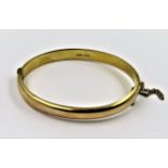 15ct Gold bangle of plain oval design, 10g 58mm x 49mm (internal) 64mm x 53mm (external)