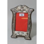 Early 20th Century Birmingham silver photograph frame of Art Nouveau design, 10.25ins high