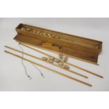 Early 20th Century wooden fishing game in original box, 25.5ins long overall