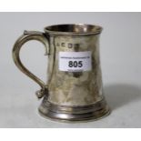 George III silver mug of plain tapering form with scroll handle, London 1775, maker IR, 3 7/8ins