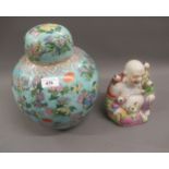 Large Chinese ginger jar and cover with floral decoration on a pale blue ground, printed red mark to