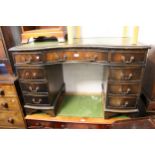 Reproduction mahogany serpentine fronted twin pedestal desk