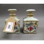 Pair of 19th Century Paris porcelain perfume flasks painted with flowers, 4.25ins high