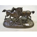 Patinated bronze group of two horses after a model by E. Delabrierre, signed in the bronze, 10ins