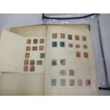 Collection of Victorian stamps on loose leaves, including a Penny Black