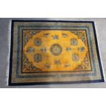 Chinese woollen carpet of Art Deco design on yellow ground, 12ft x 9ft approximately