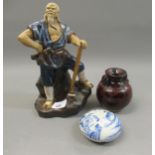 Chinese pottery figure of a man with an axe, small Chinese two handled red mottled stoneware vase,
