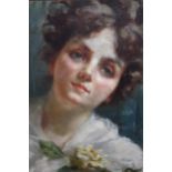 Early 20th Century oil on canvas, head and shoulder portrait of a young lady with a yellow rose,