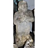 Weathered carved stone garden sculpture of a standing female figure, 37ins high