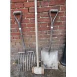 Garden coke fork, a large shovel and a large mallet