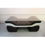 Modern designer two tone leather scroll form window seat / coffee table with tempered glass top,