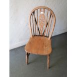 Set of six (five plus one) 20th Century oak wheelback dining chairs