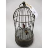 20th Century brass bird in a cage musical box, 10.5ins high