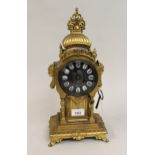 19th Century French gilded spelter mantel clock, the silvered dial with enamel numerals and a two