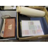 Two large boxes containing a collection of various First Day covers, postcards and stamps etc.